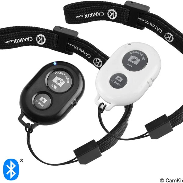 White and black bluetooth remote controll with two buttons.